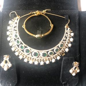 Necklace, earrings and bracelet